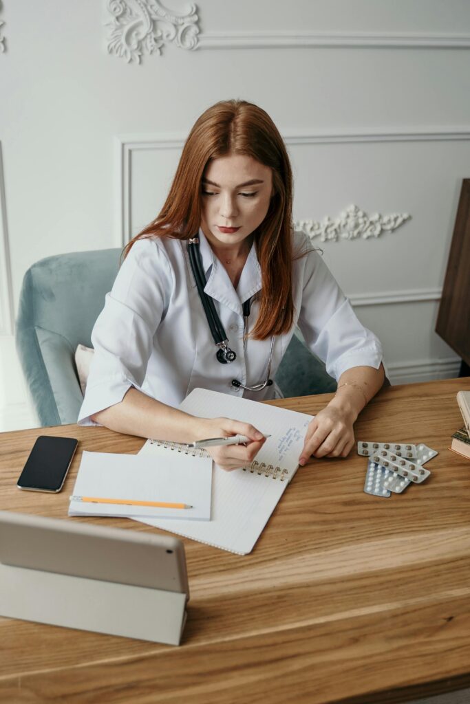 Doctor making notes