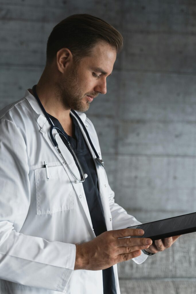 Doctor with tablet screen